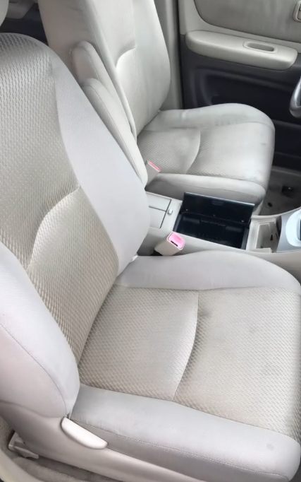 Clean front car seats after mobile detailing